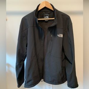 The NorthFace Men’s lightweight jacket. Rain and wind resistant.